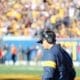 WVU Football HC Neal Brown head down