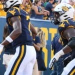 WVU Football Traylon Ray and Ja'Quay Hubbard celebrate