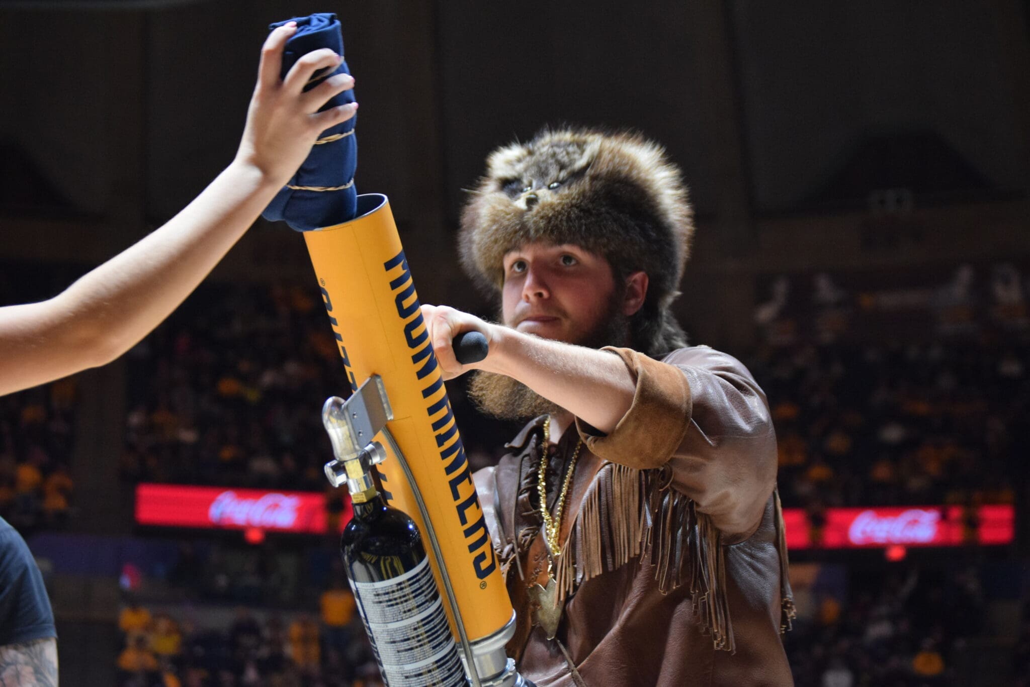 WVU Mountaineer mascot at basketball game