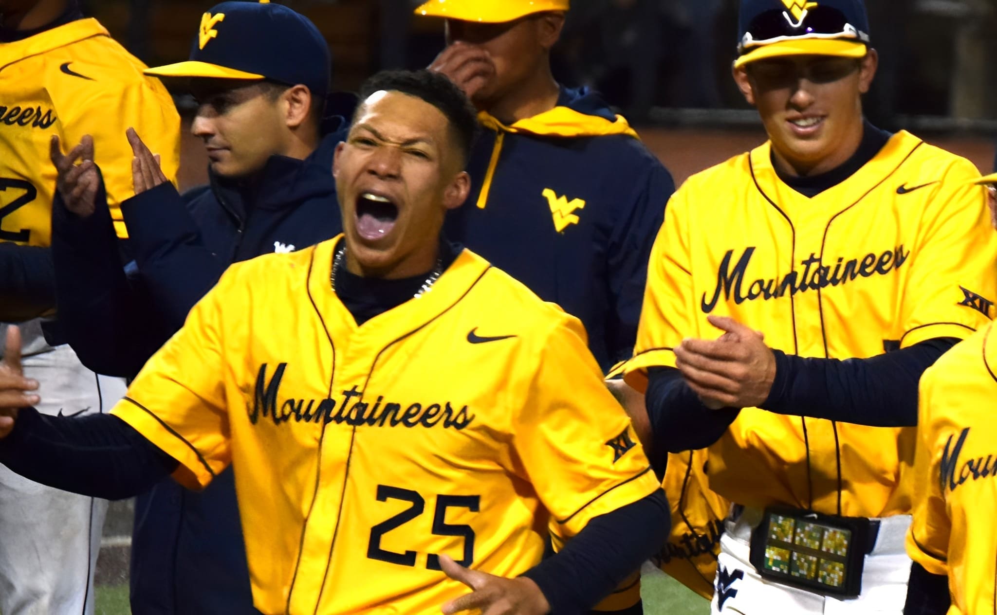 WVU Baseball Landon Wallace celebrates