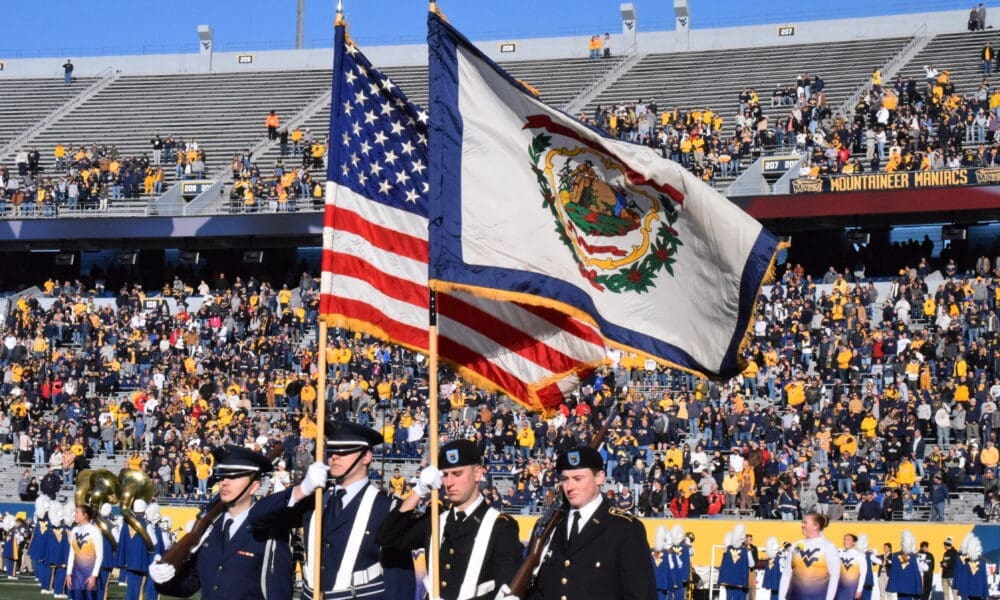 WVU Football Milan Puskar Stadium- American/WV Flag stock
