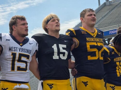 WVU Football players with Scotty Fox singing Country Roads