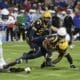 WVU Football CJ Donaldson tackled by Memphis in Frisco Bowl