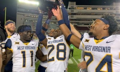 WVU Football players with Black Diamond Trophy