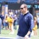 WVU AD Wren Baker on field