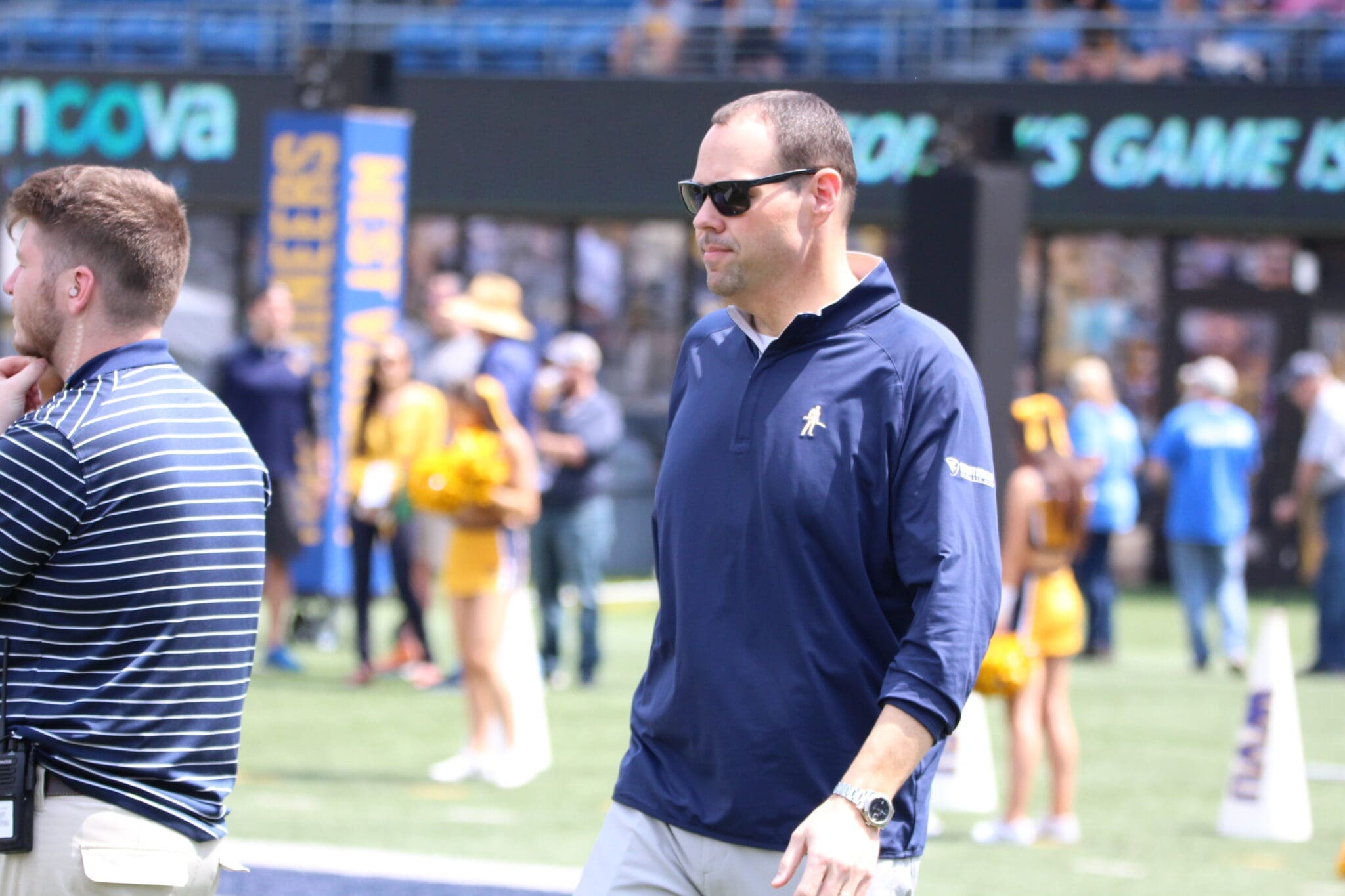 WVU AD Wren Baker on field
