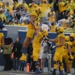 WVU Football TE Kole Taylor celebrates a TD against Texas Tech with Zach Frazier, Wyatt Milum and Doug Nester in image