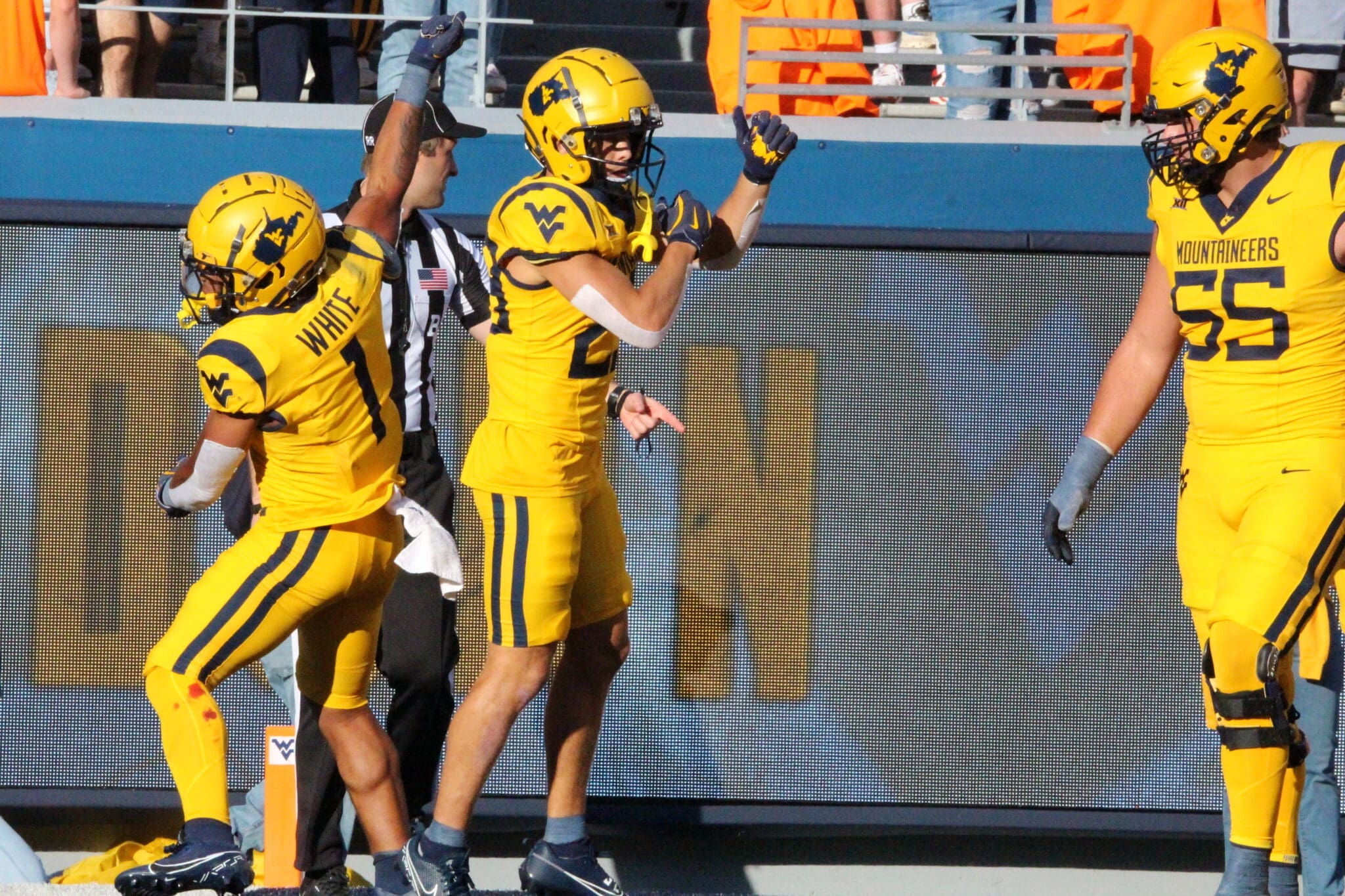 WVU Football Jahiem White and Preston Fox celebrate