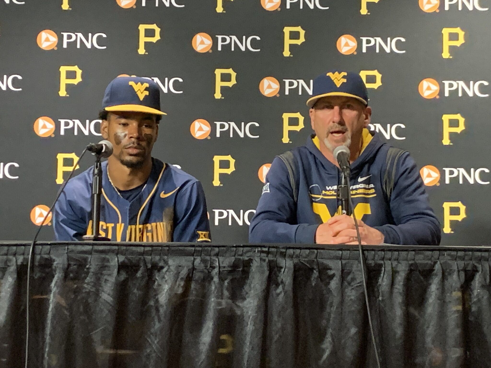WVU Baseball head coach Randy Mazey and shortstop Tevin Tucker speak after Backyard Brawl at PNC Park