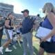 WVU Football HC Neal Brown with ESPN reporter