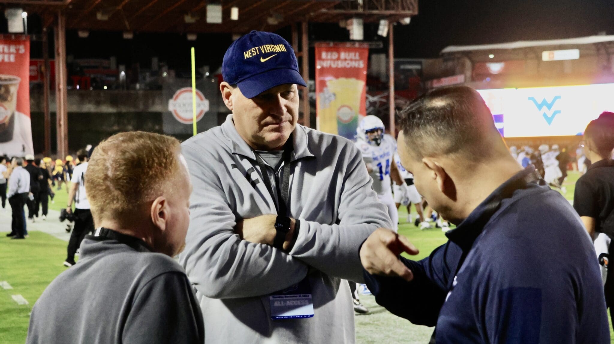 WVU Football HC Rich Rodriguez with Michael Fragale and Mike Montoro