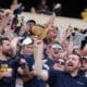 WVU Football fans crowd shot stock