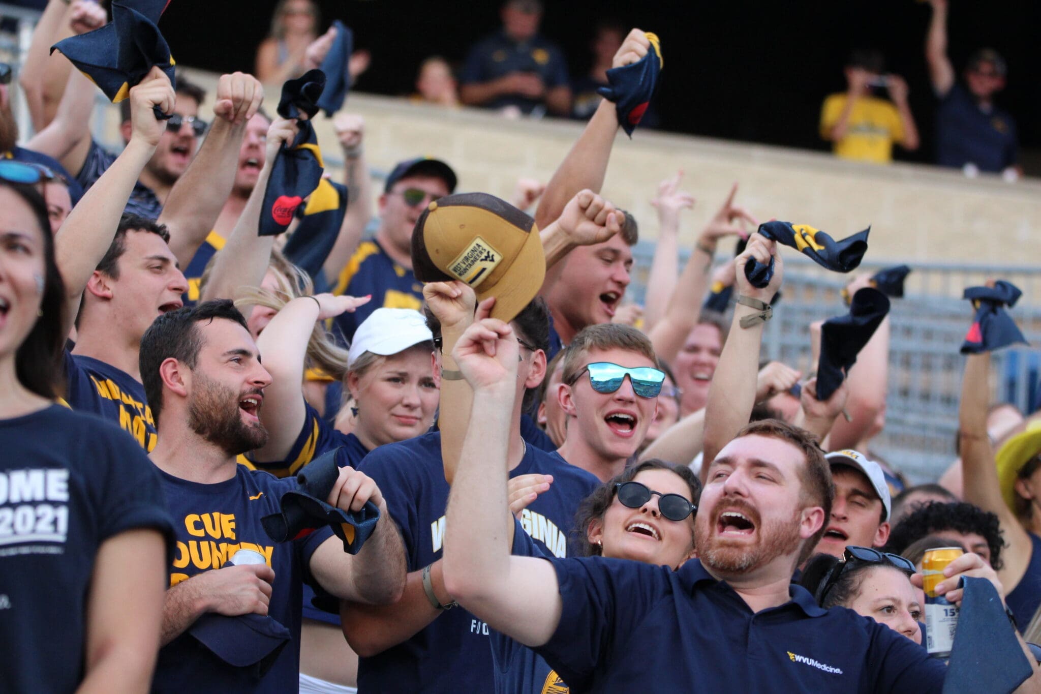 WVU Football fans crowd shot stock