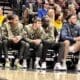 WVU Basketball team on bench