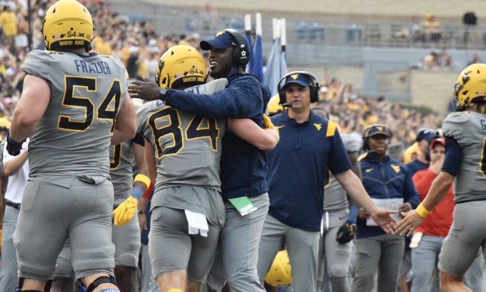 WVU Football Hudson Clement and Coach Bilal Marshall
