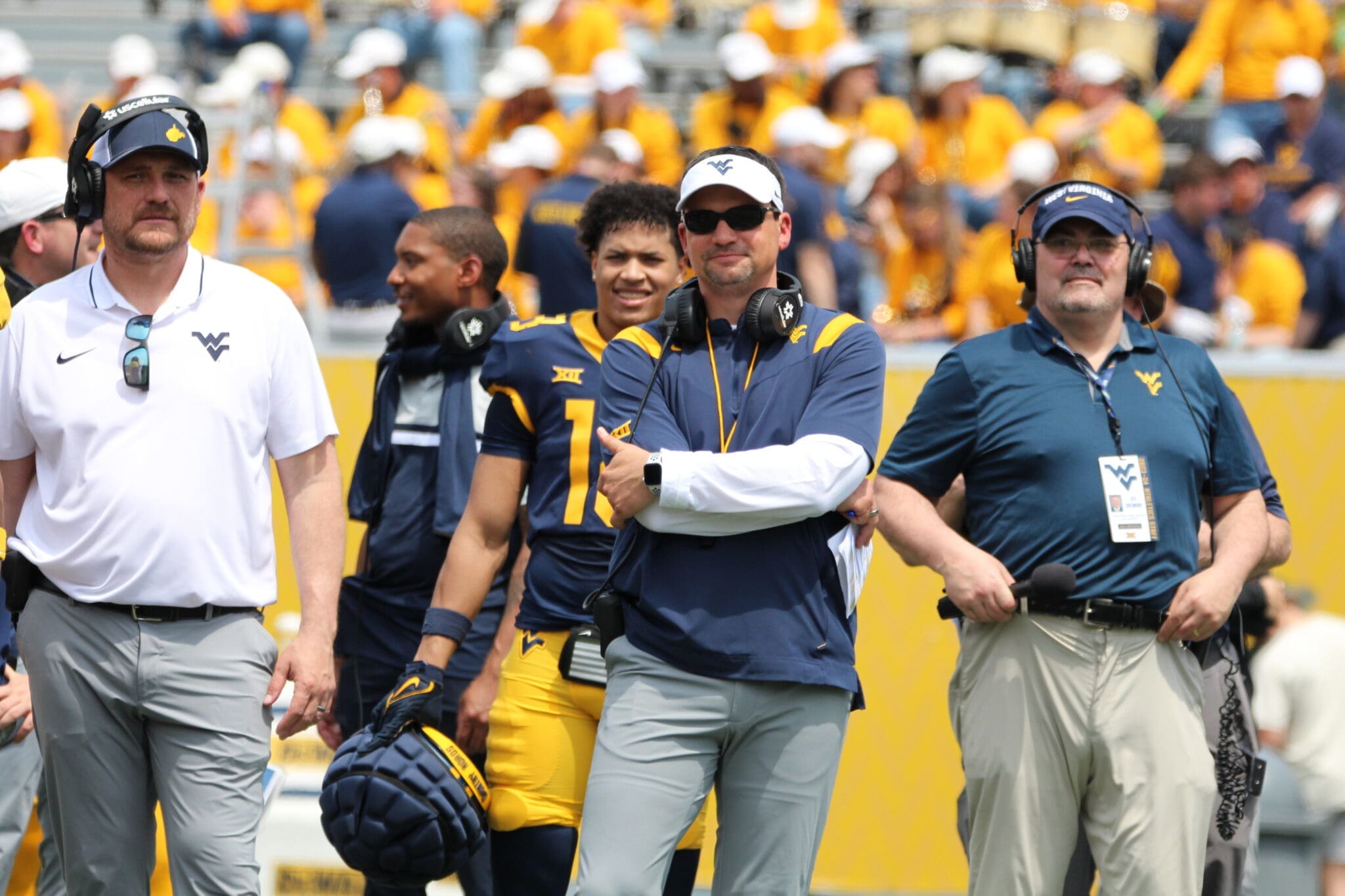 WVU Football head coach Neal Brown and OLB coach Victor Cabral