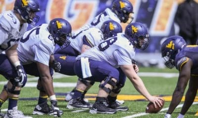 WVU Football line of scrimmage stock