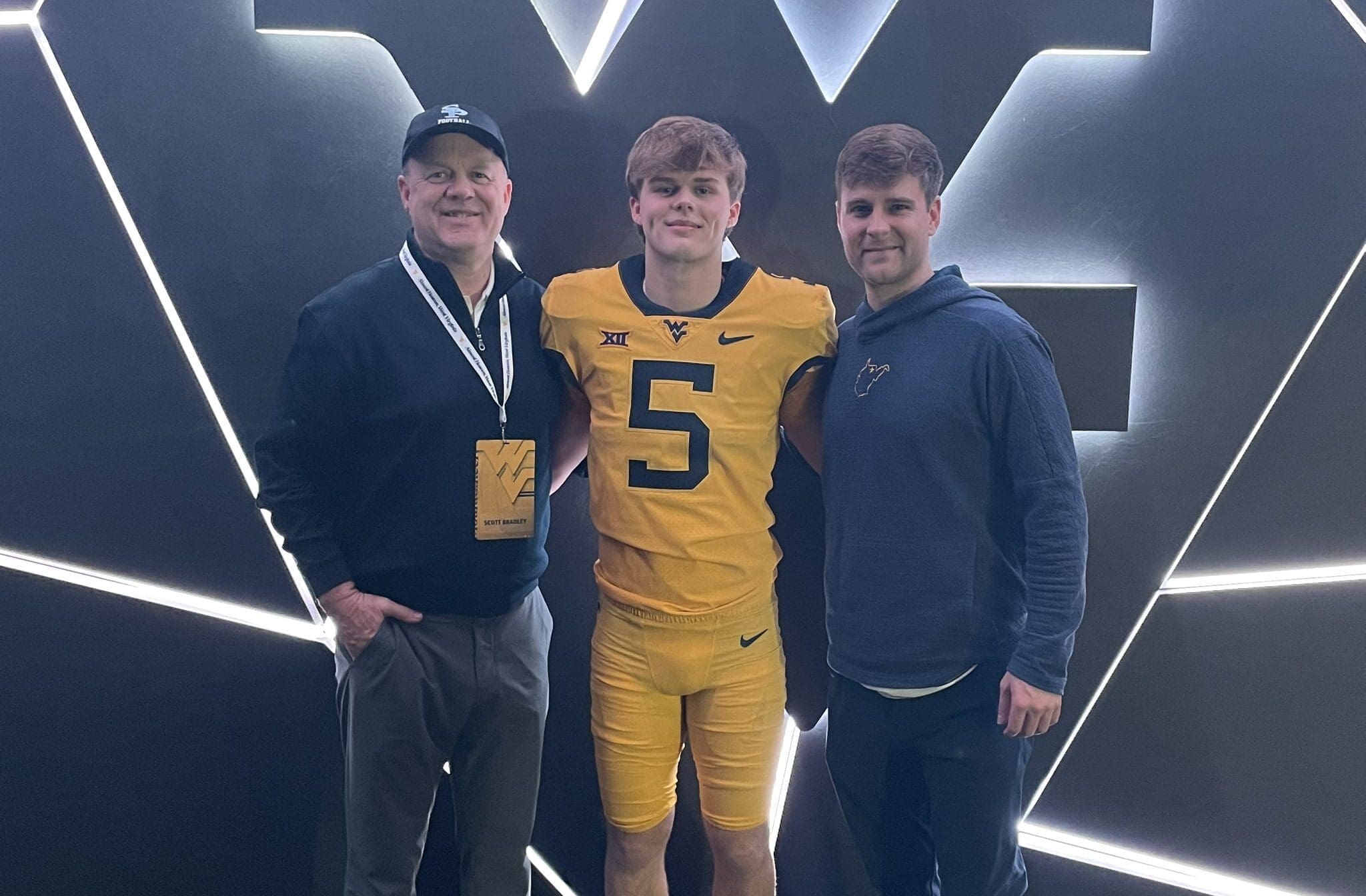 WVU Football QB coach Tyler Allen with recruit Brock Bradley