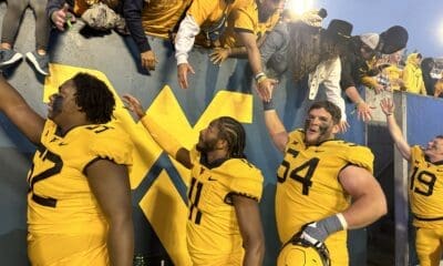 WVU Football Zach Frazier and Beanie Bishop with fans