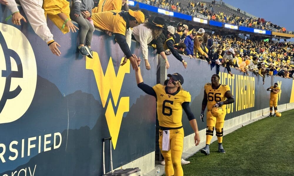 WVU Football QB Garrett Greene with fans
