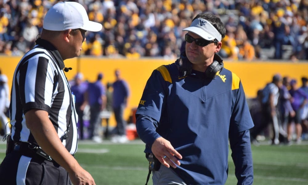 WVU Football HC Neal Brown and ref