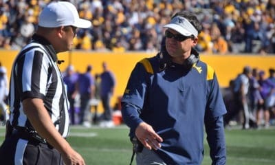WVU Football HC Neal Brown and ref