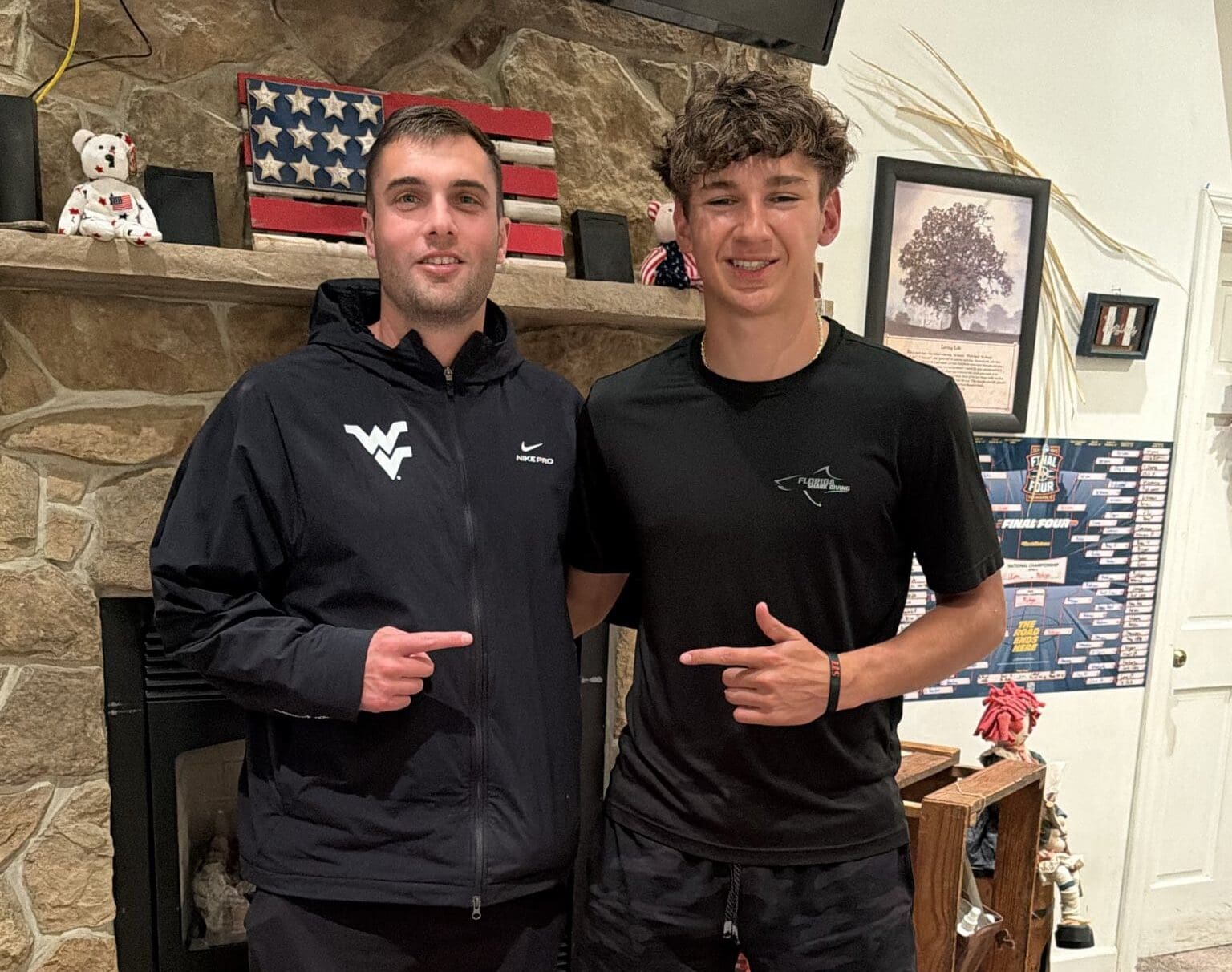 Chase Guers with WVU Football WR Coach Ryan Garrett