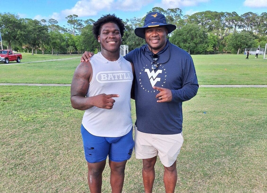 WVU Football DL recruit Christian Hudson and DL coach Andrew Jackson