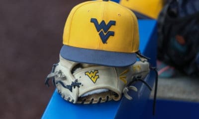 WVU baseball hat and glove stock