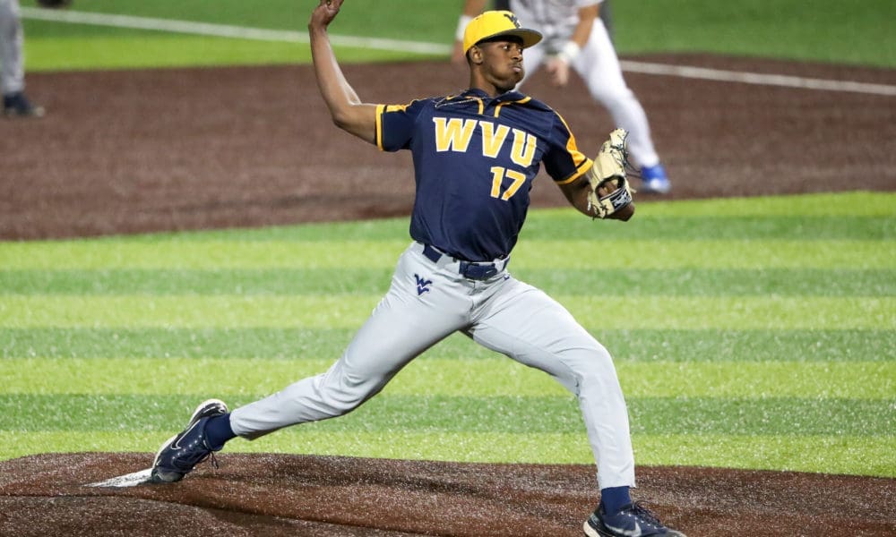WVU Baseball reliever Carlson Reed winds up to throw.