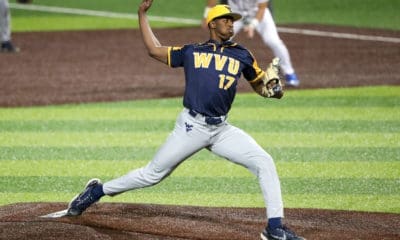 WVU Baseball reliever Carlson Reed winds up to throw.