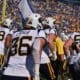 WVU Football team running out on field for Backyard Brawl