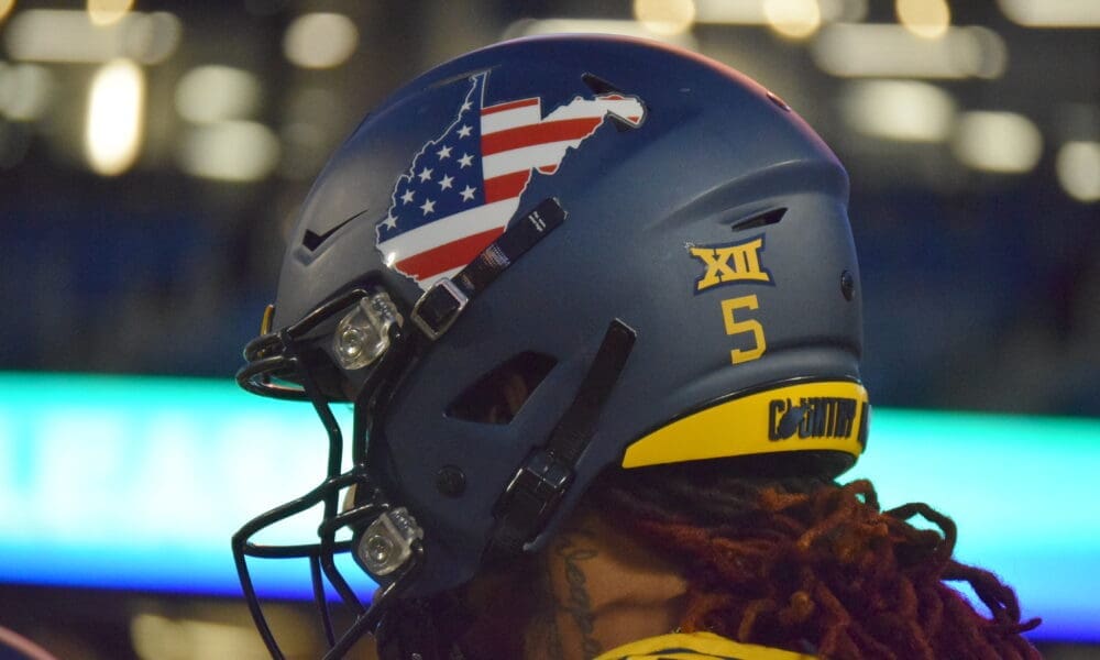 WVU Football US flag helmet stock
