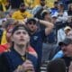 WVU Football fan hands on head during Utah game