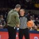 WVU Basketball Josh Eilert and Referee
