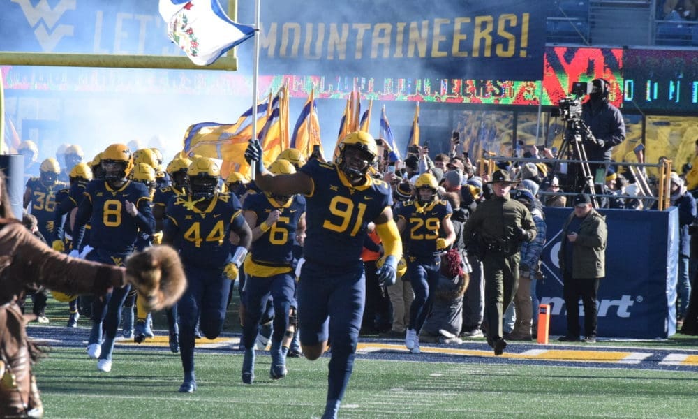 WVU Football DL Sean Martin with flag
