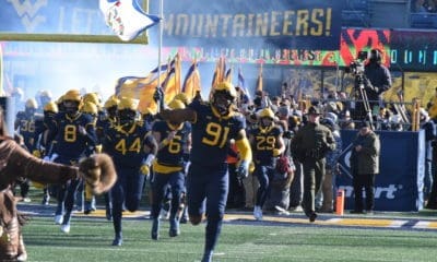 WVU Football DL Sean Martin with flag