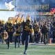 WVU Football DL Sean Martin with flag