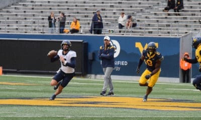 WVU Football QB Garrett Greene with HC Neal Brown watching