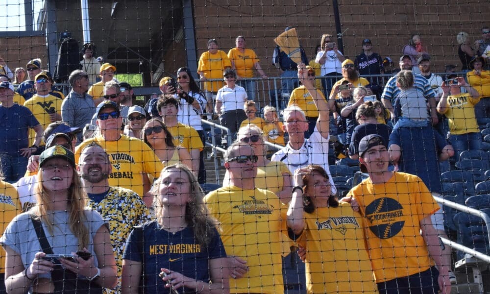 WVU Baseball fans with broom
