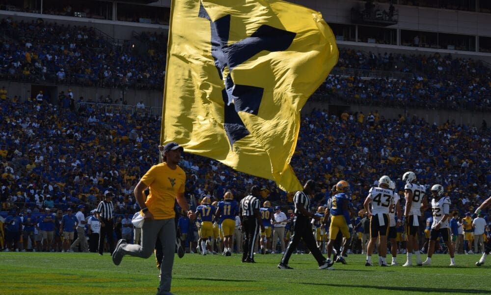 WVU flag stock at Pitt
