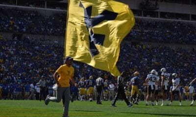 WVU flag stock at Pitt
