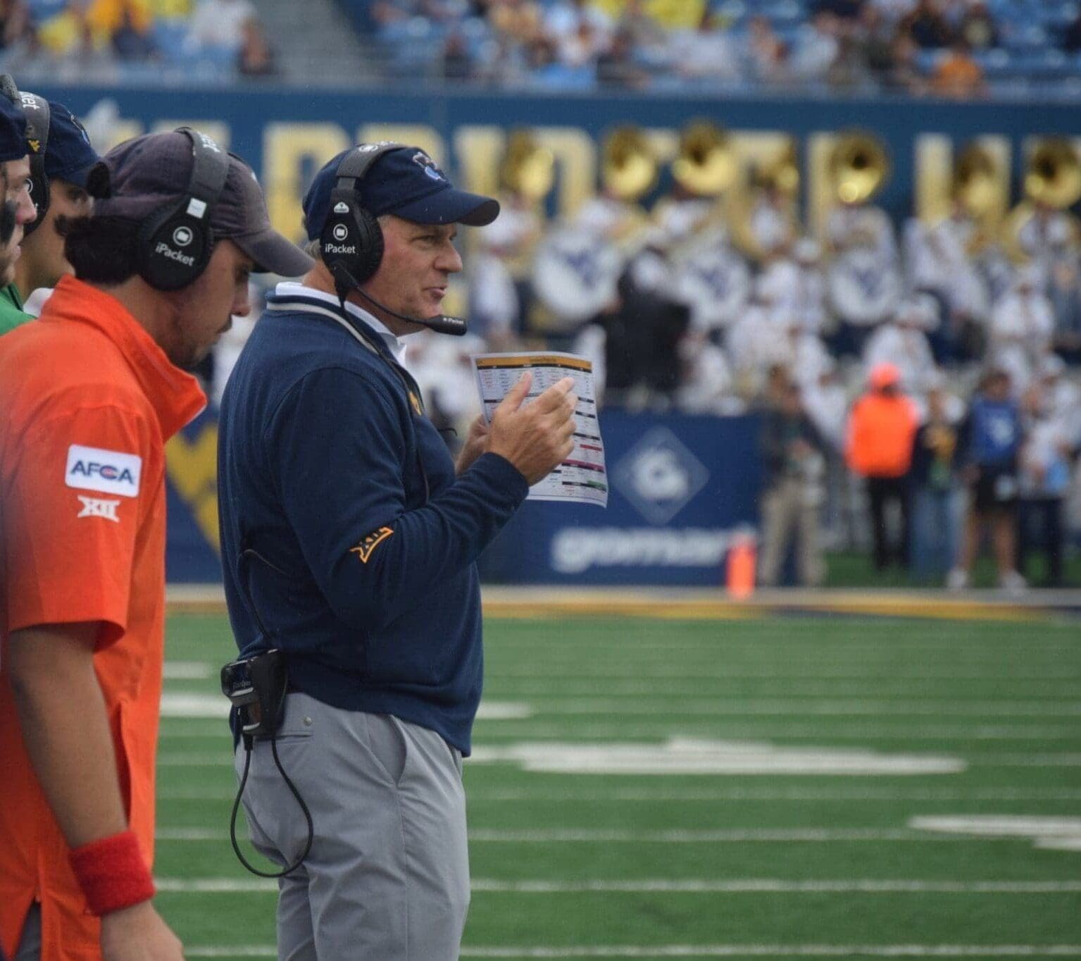 WVU Football HC Rich Rodriguez on field during game