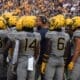 WVU Football Secondary with coach Donate Wright in the middle