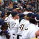 WVU baseball team in dugout