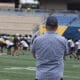 Mike Asti watching WVU football practice