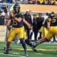 WVU Football QB Scotty Fox throwing against Colorado