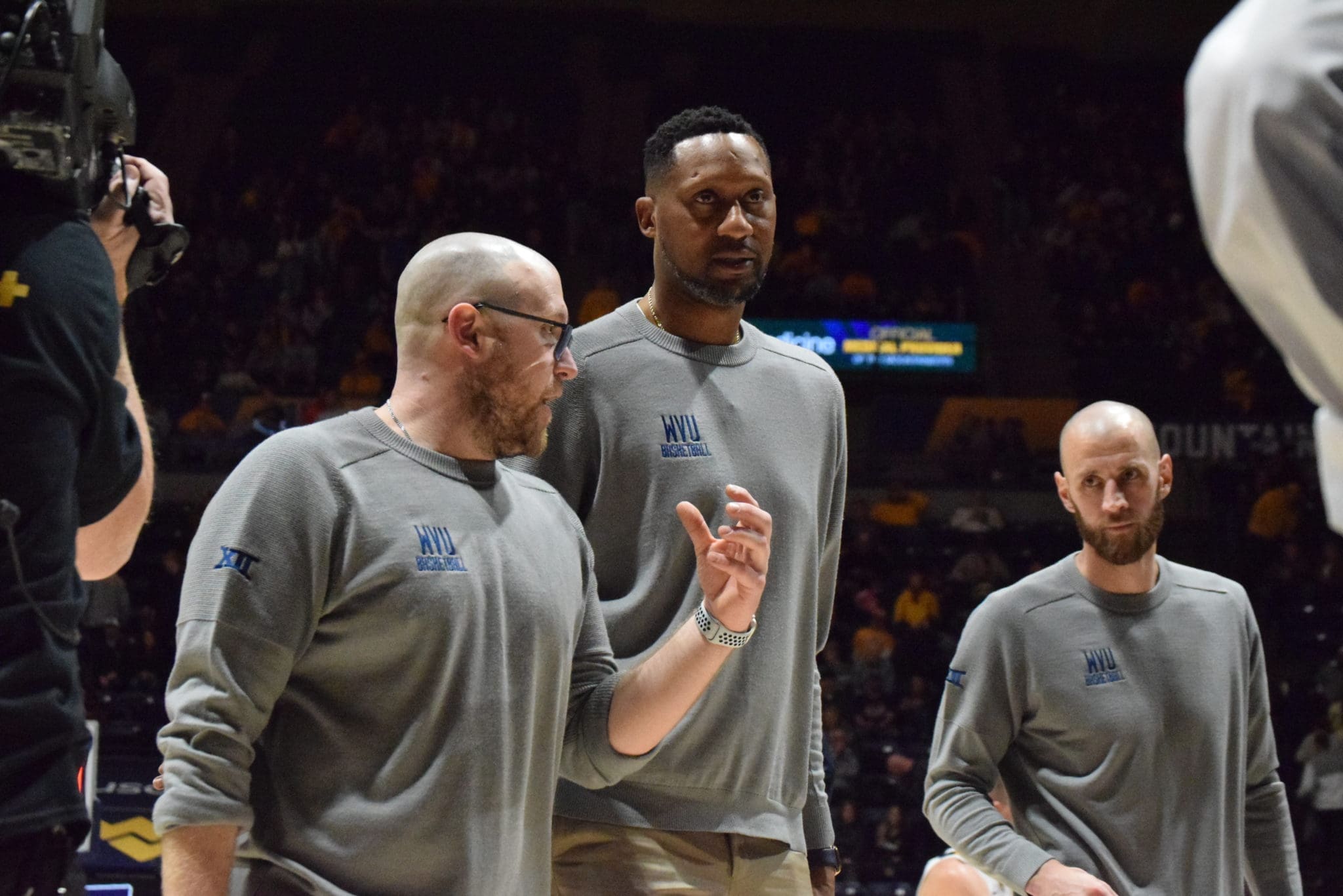 WVU Basketball director of recruiting Jay Kuntz and assistant coaches DerMarr Johnson and Alex Ruff