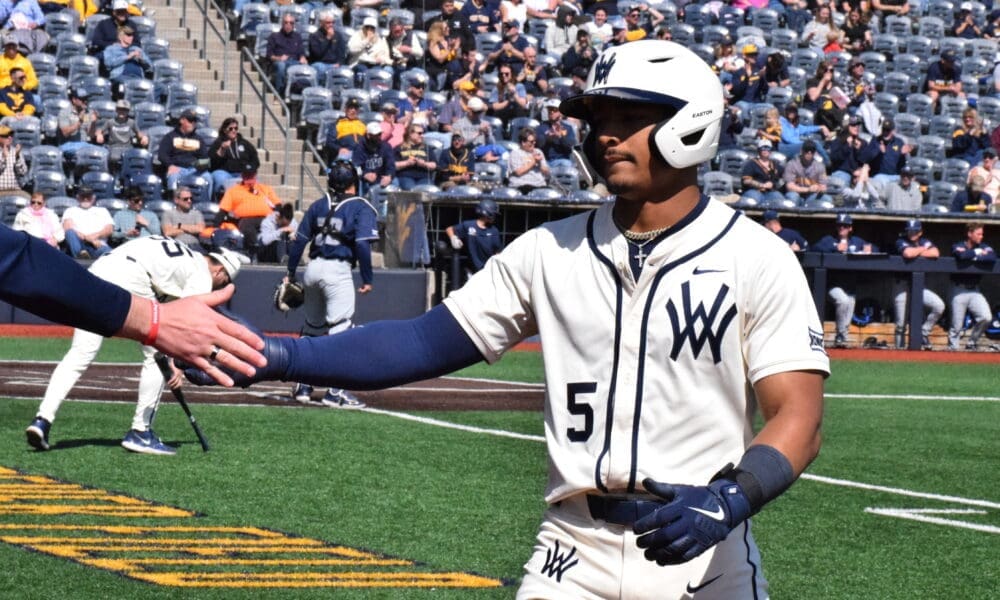 WVU Baseball Armani Guzman hand slap