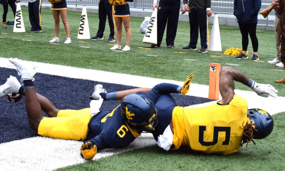 WVU Football DB Jacolby Spells and Devin Carter